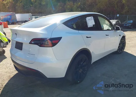 2022 Tesla Model Y Long Range Dual Motor All-Wheel Drive z USA, uszkodzony, nr VIN 7SAYGDEE0NF379863